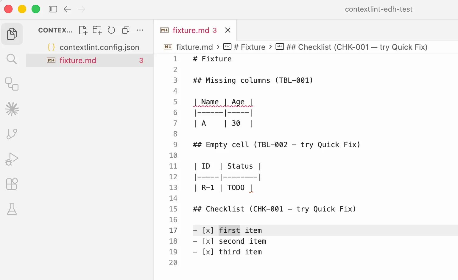 Editor state after applying the TBL-002 and CHK-001 Quick Fixes